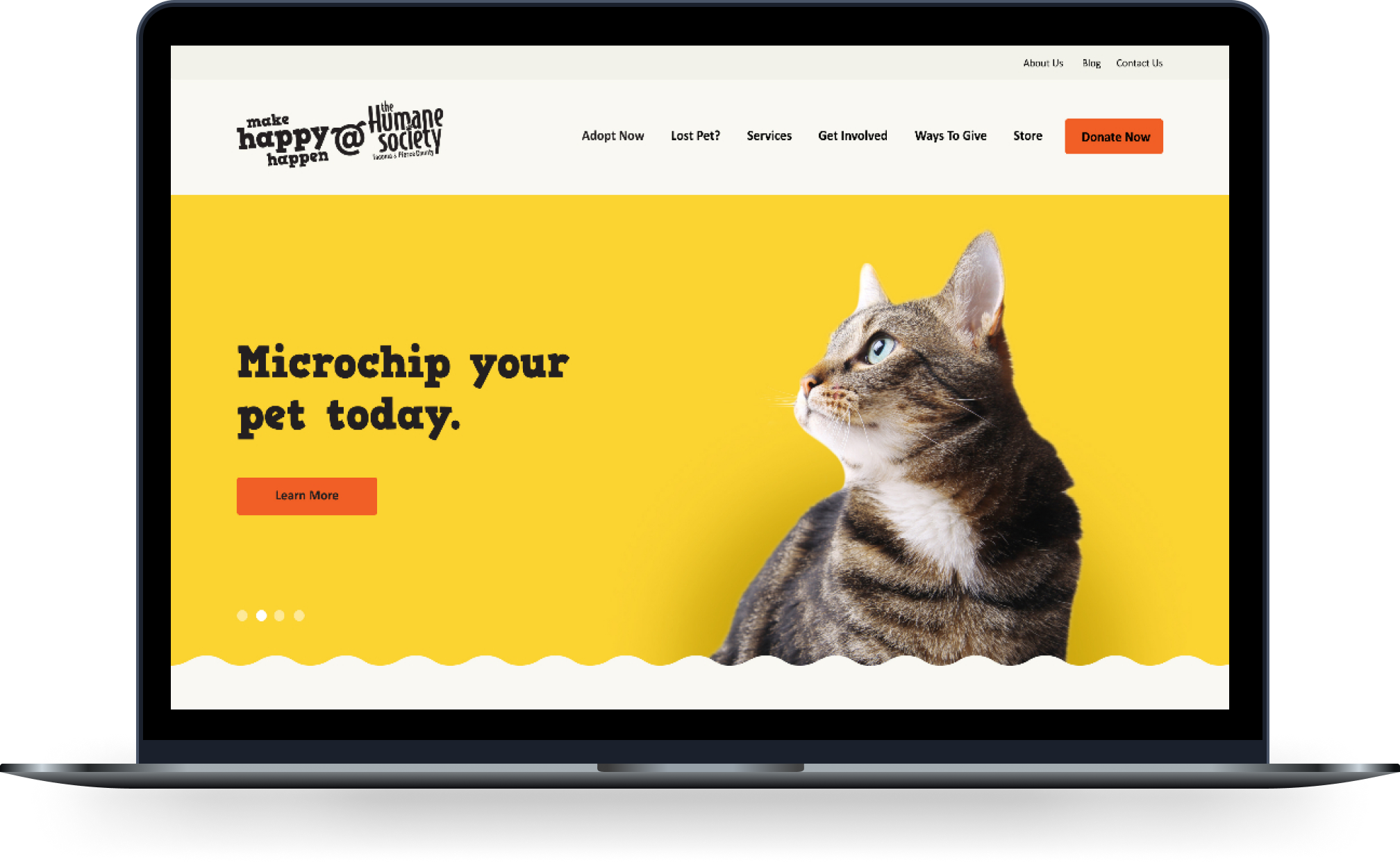 Humane Society home page on a laptop screen