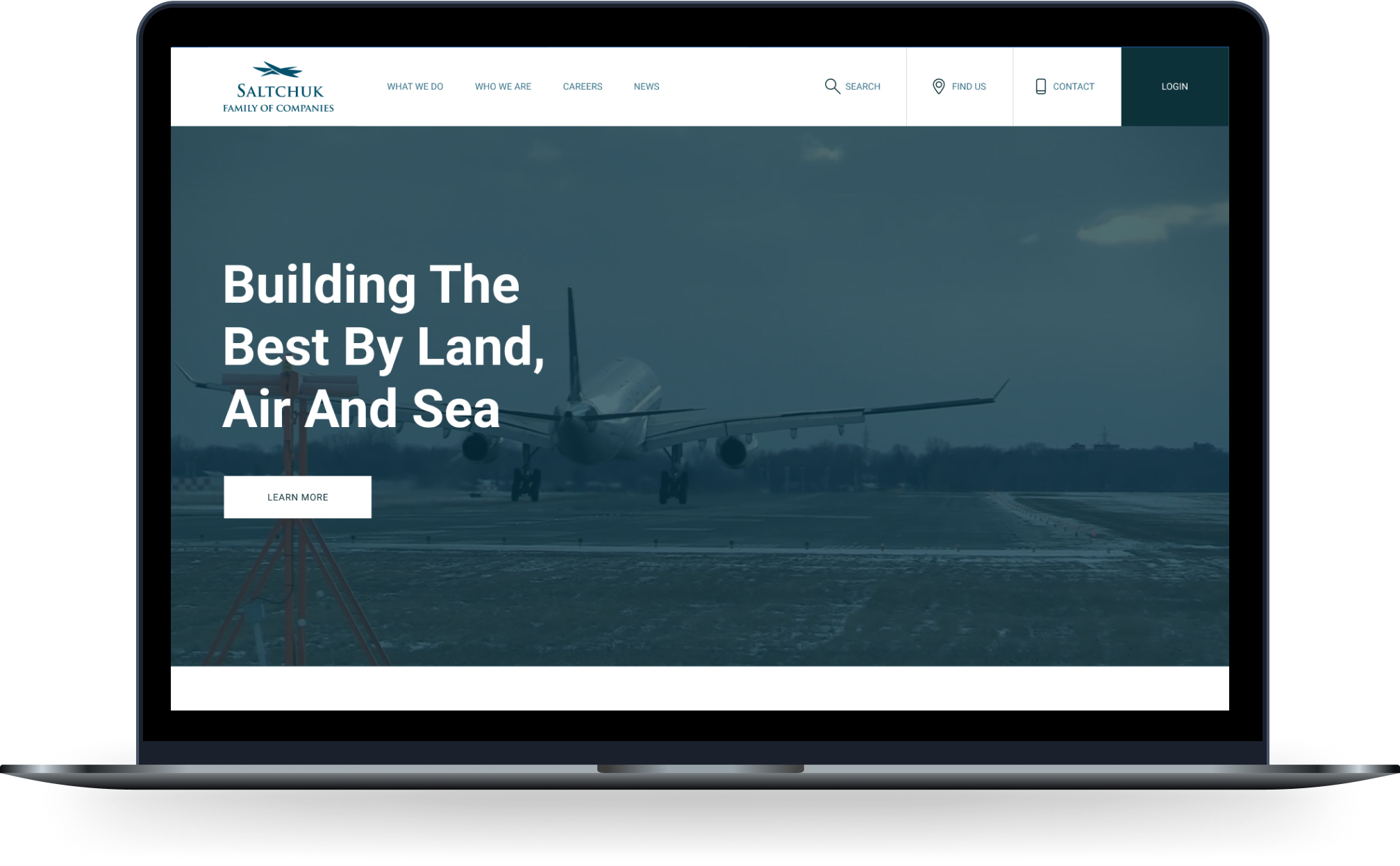 Saltchuk home page on a laptop